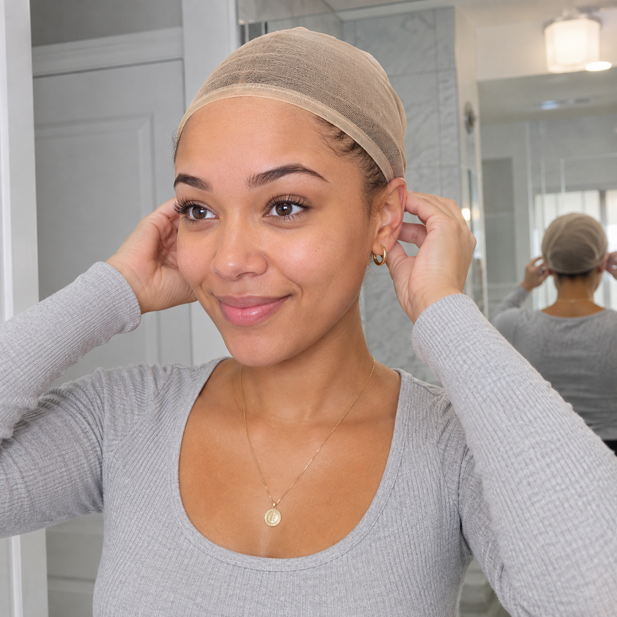 SILKORA wig prep: model wearing nude nylon wig cap before application, front and mirror view