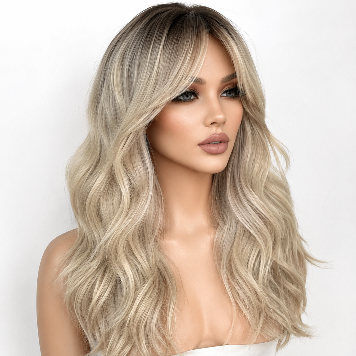 SILKORA 24 inch wavy full-head wig in Champagne Blonde, three-quarter view on model white background